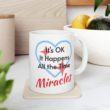 Inspirational faith-based ceramic mug with “Miracles Happen” design with message